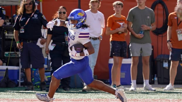 Sep 30, 2023; Austin, Texas, USA; Kansas Jayhawks wide receiver Trevor Wilson (7) runs in to the end zone for a touchdown after making catch in the second half against the Texas Longhorns at Darrell K Royal-Texas Memorial Stadium. Mandatory Credit: Scott Wachter-USA TODAY Sports  